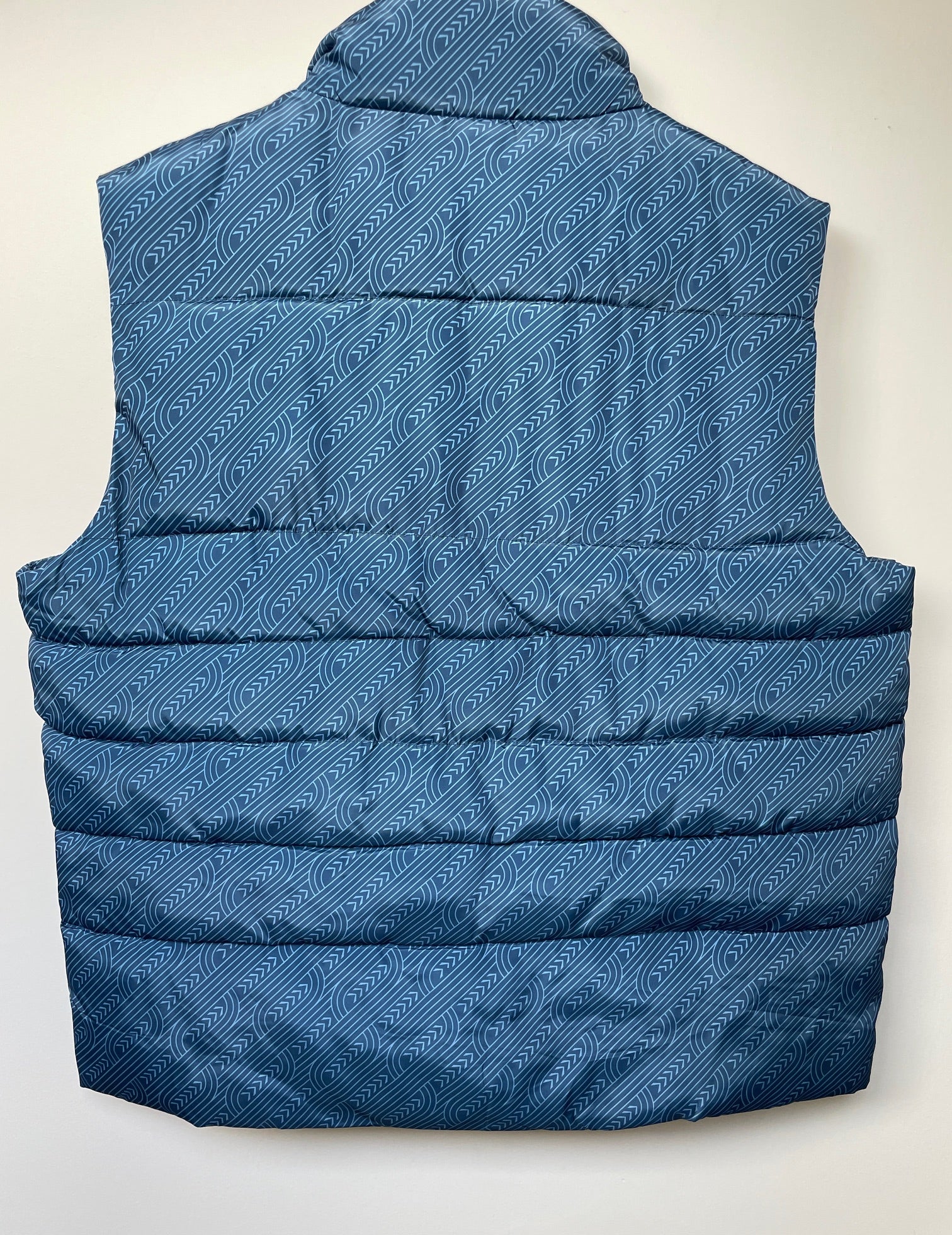 Men’s Pakati Puffer Vest in blue – lightweight winter outerwear by Kaleo for casual New Zealand men’s fashion.