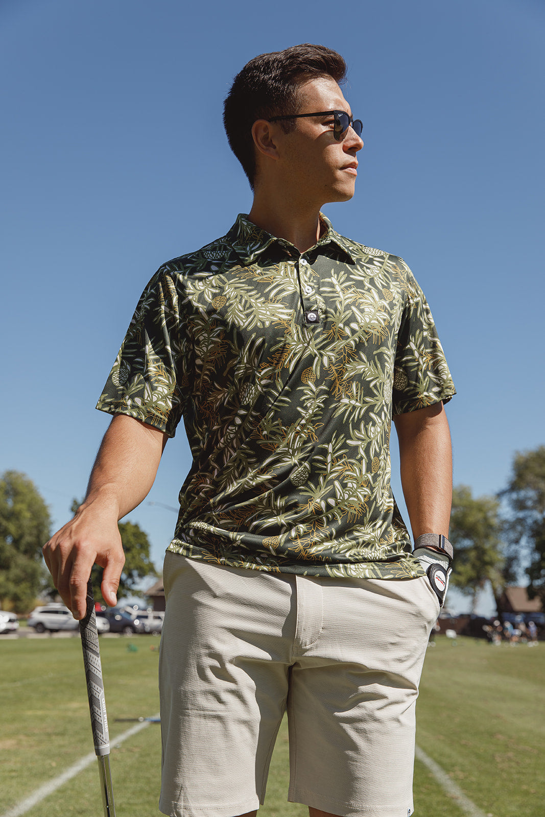 Kauri Men’s Golf Polo in deep green with native kauri design. NZ golf shirt made from breathable, moisture-wicking fabric for all-day comfort.