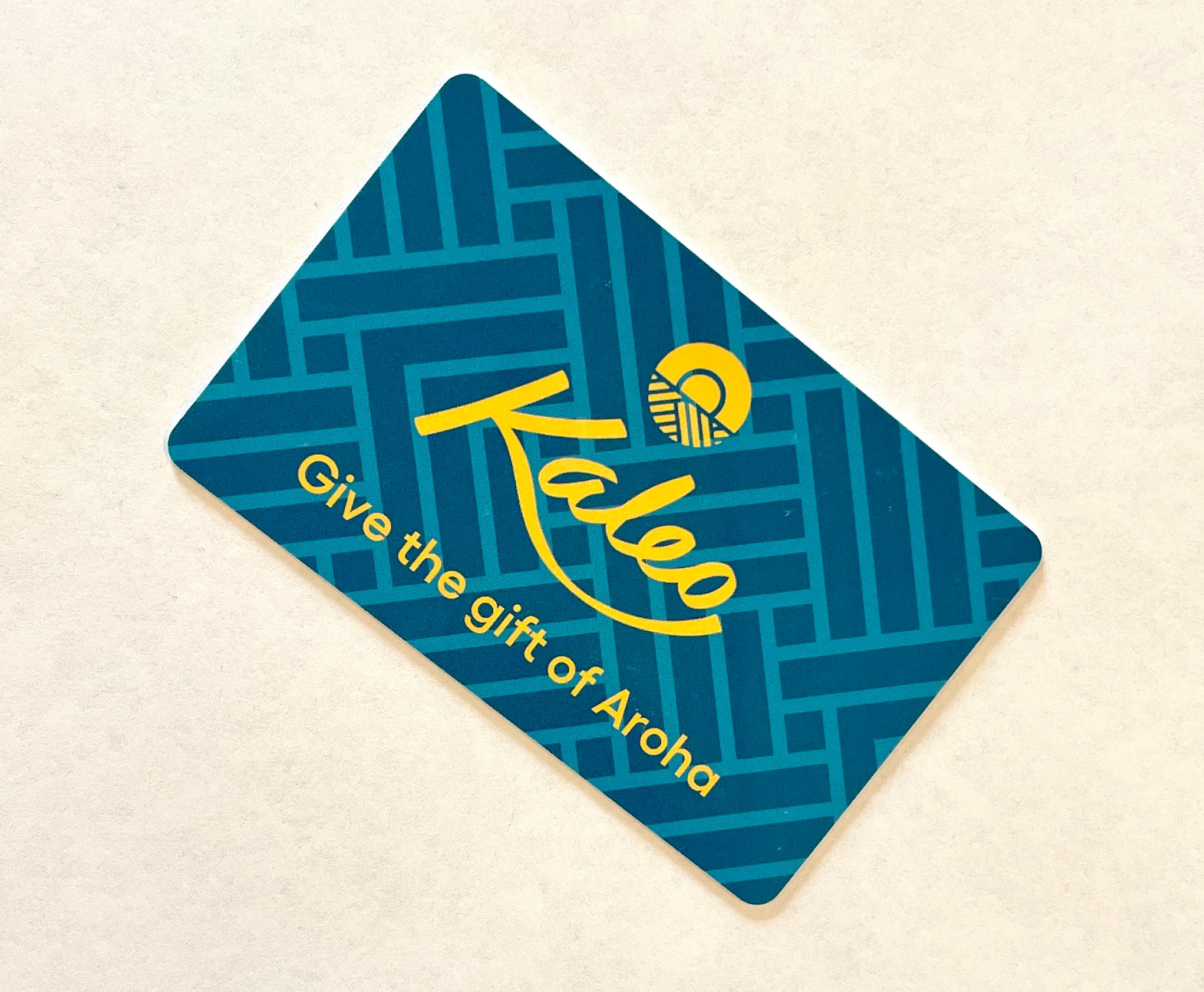 Kaleo Gift Card with "Give the gift of Aroha" message, perfect for New Zealand coastal fashion, apparel, and homeware shopping.