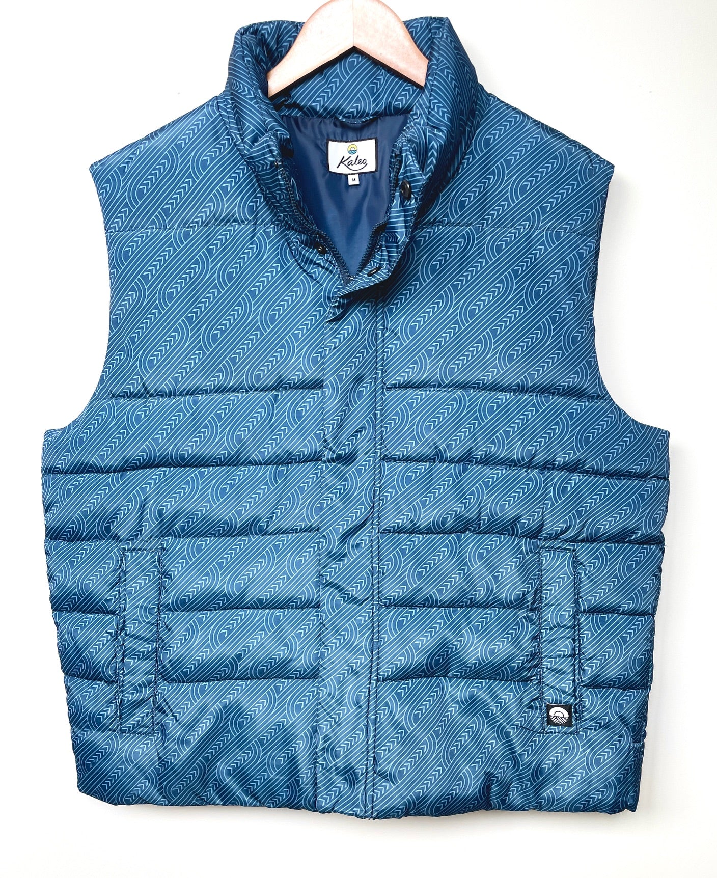 Men’s Pakati Puffer Vest in blue – lightweight winter outerwear by Kaleo for casual New Zealand men’s fashion.