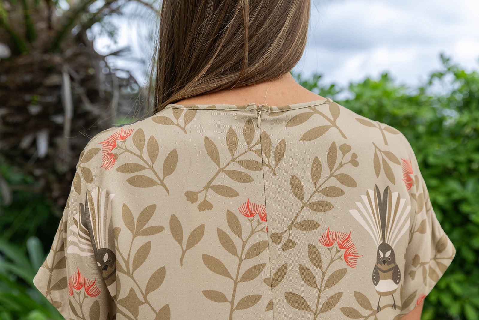 Women’s clothing New Zealand – comfortable women’s dress with Fantail (Pīwakawaka) print, NZ-designed wearable art by Kaleo; relaxed, travel-friendly style