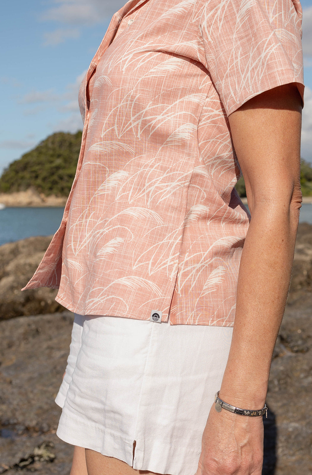 Womens short sleeve Kiwi Classic shirt in soft pink Toe Toe print – lightweight button-up summer shirt inspired by New Zealand native grasses, perfect for casual coastal style