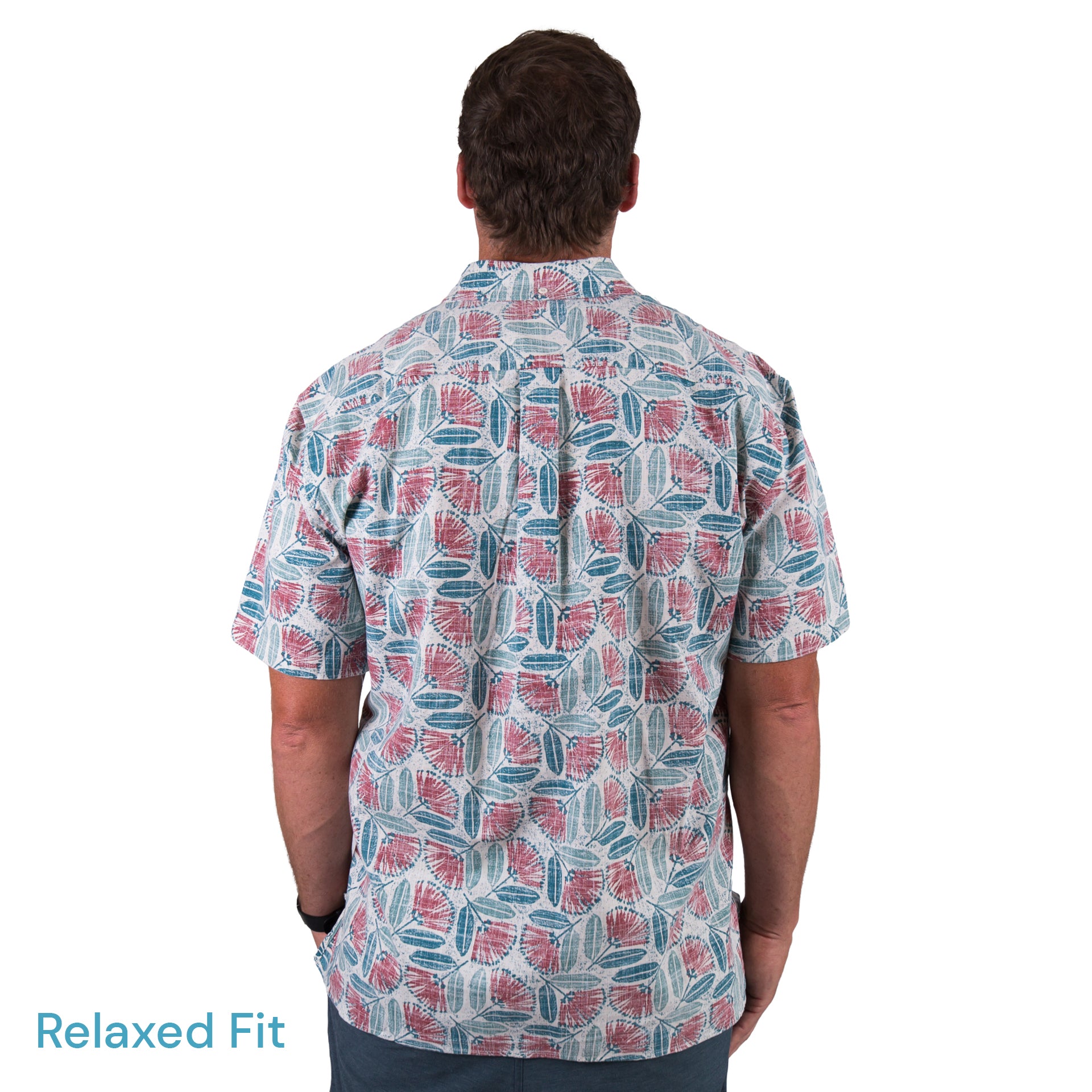 Kaleo Pohutukawa in Bloom men’s Kiwi Classic short sleeve shirt, featuring red and green pohutukawa floral print, New Zealand summer fashion.