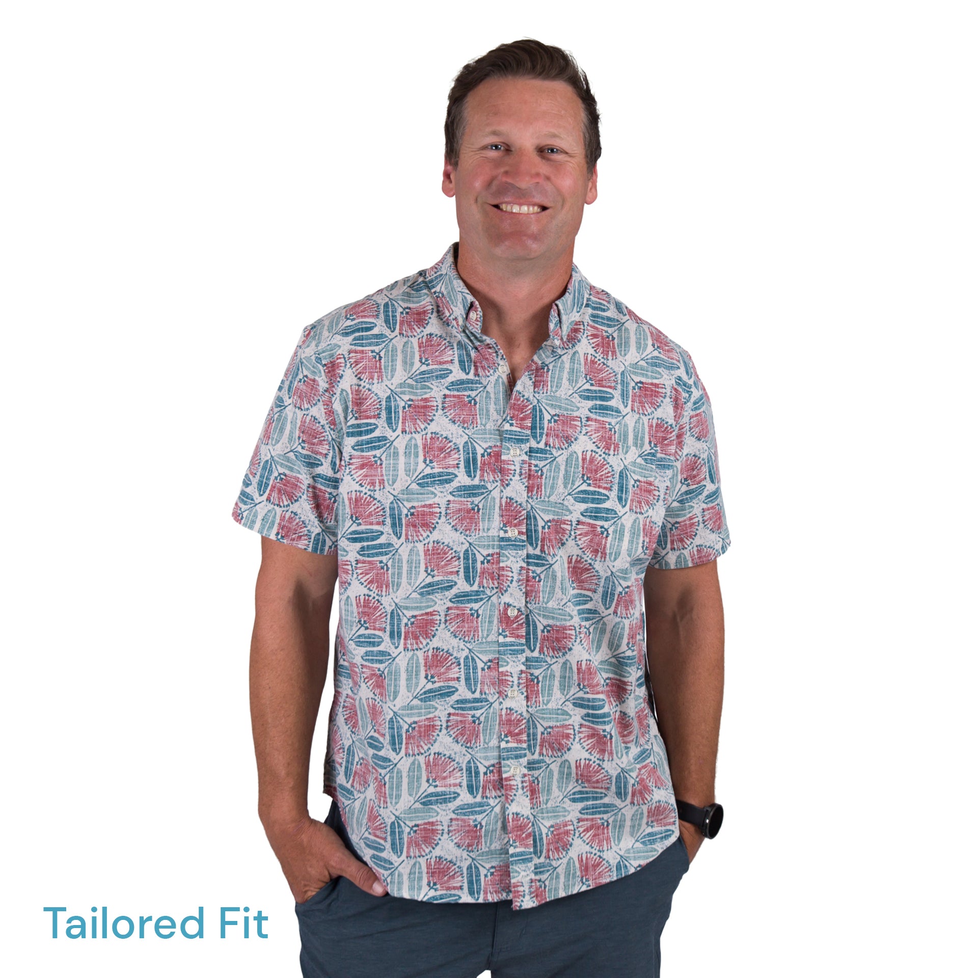 Kaleo Pohutukawa in Bloom men’s Kiwi Classic short sleeve shirt, featuring red and green pohutukawa floral print, New Zealand summer fashion.