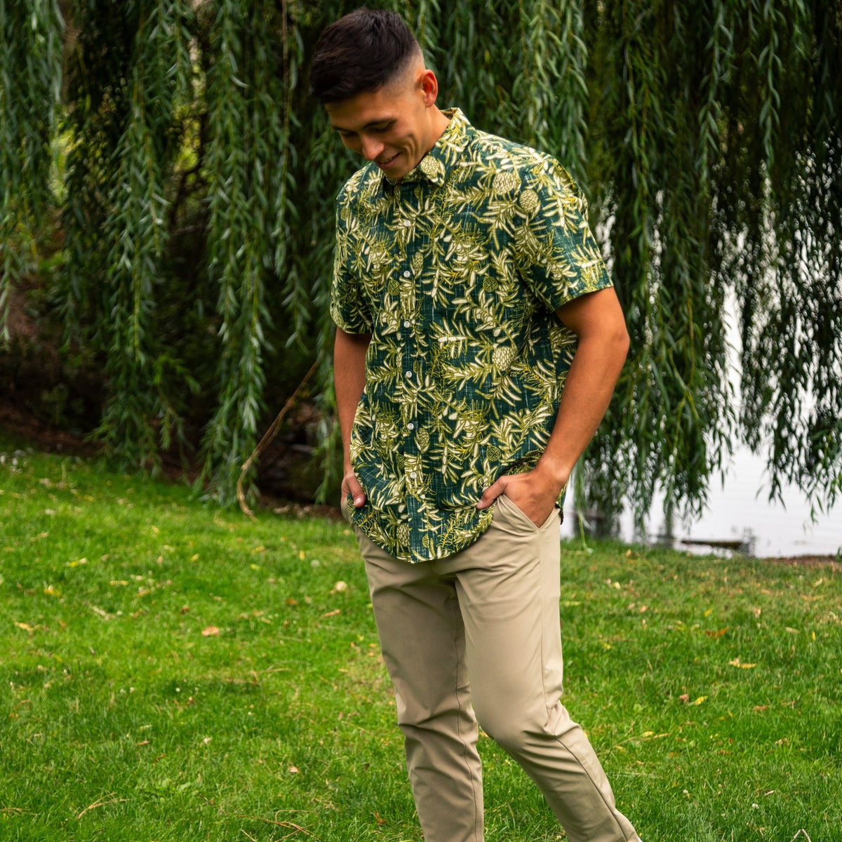 Kauri Kiwi Classic men's short sleeve shirt featuring an all-over print of native New Zealand kauri leaves in dark and light green.