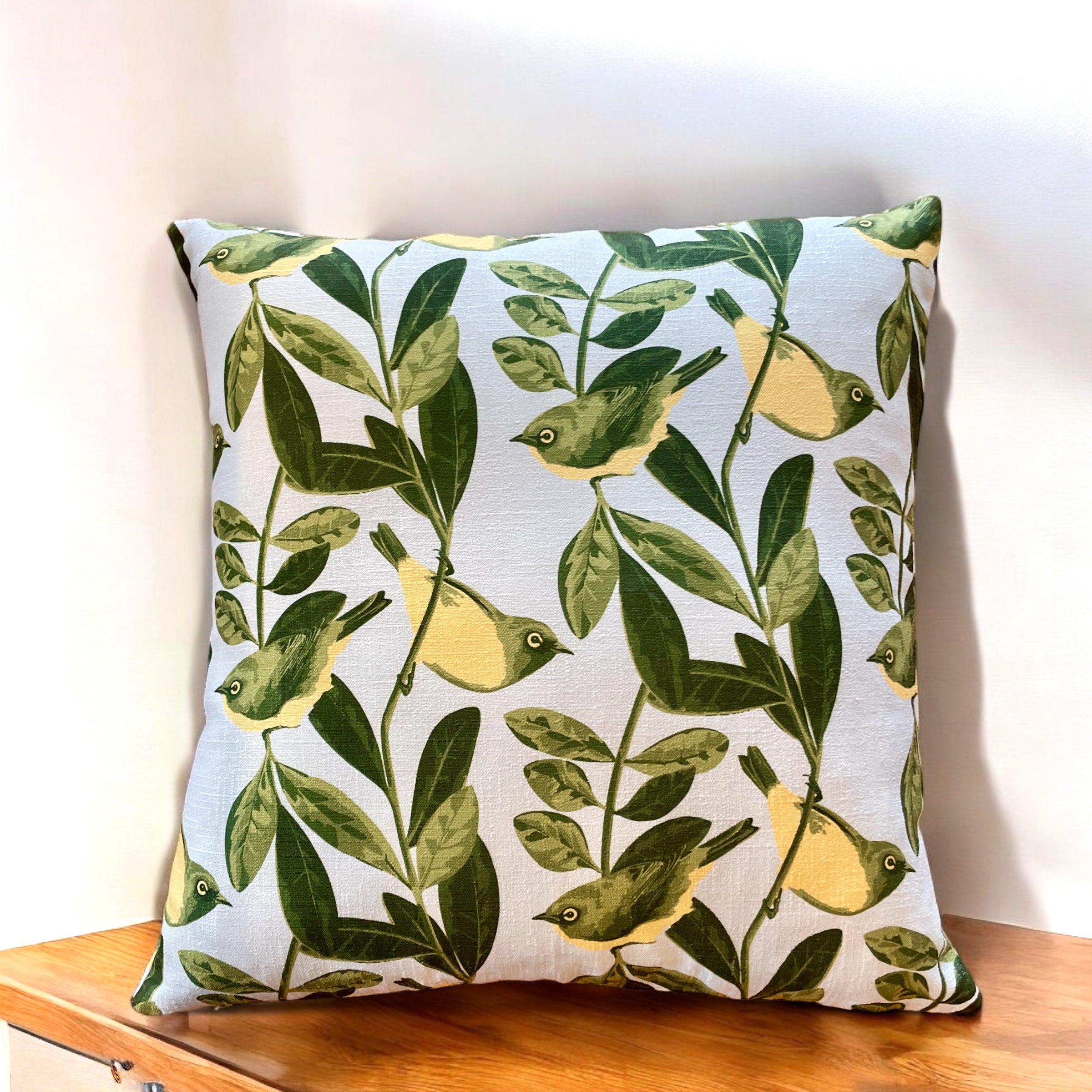 Blue Tauhou cushion cover featuring NZ native silvereye bird design – modern New Zealand home décor and gift idea by Kaleo
