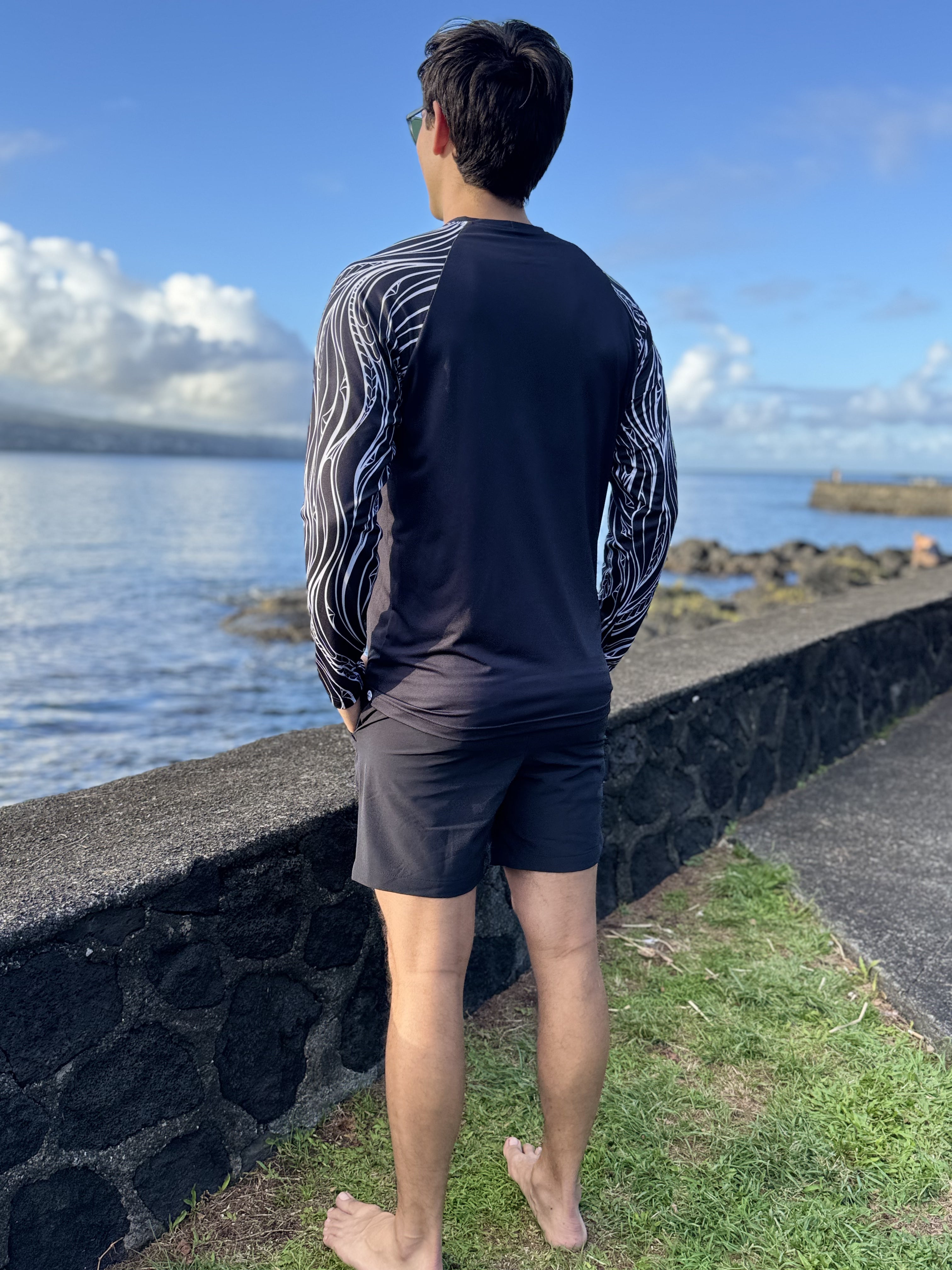 Men’s beach shirt New Zealand – Rerenga wave print, NZ-designed lightweight sun-protective beachwear by Kaleo; travel-friendly smart-casual style
