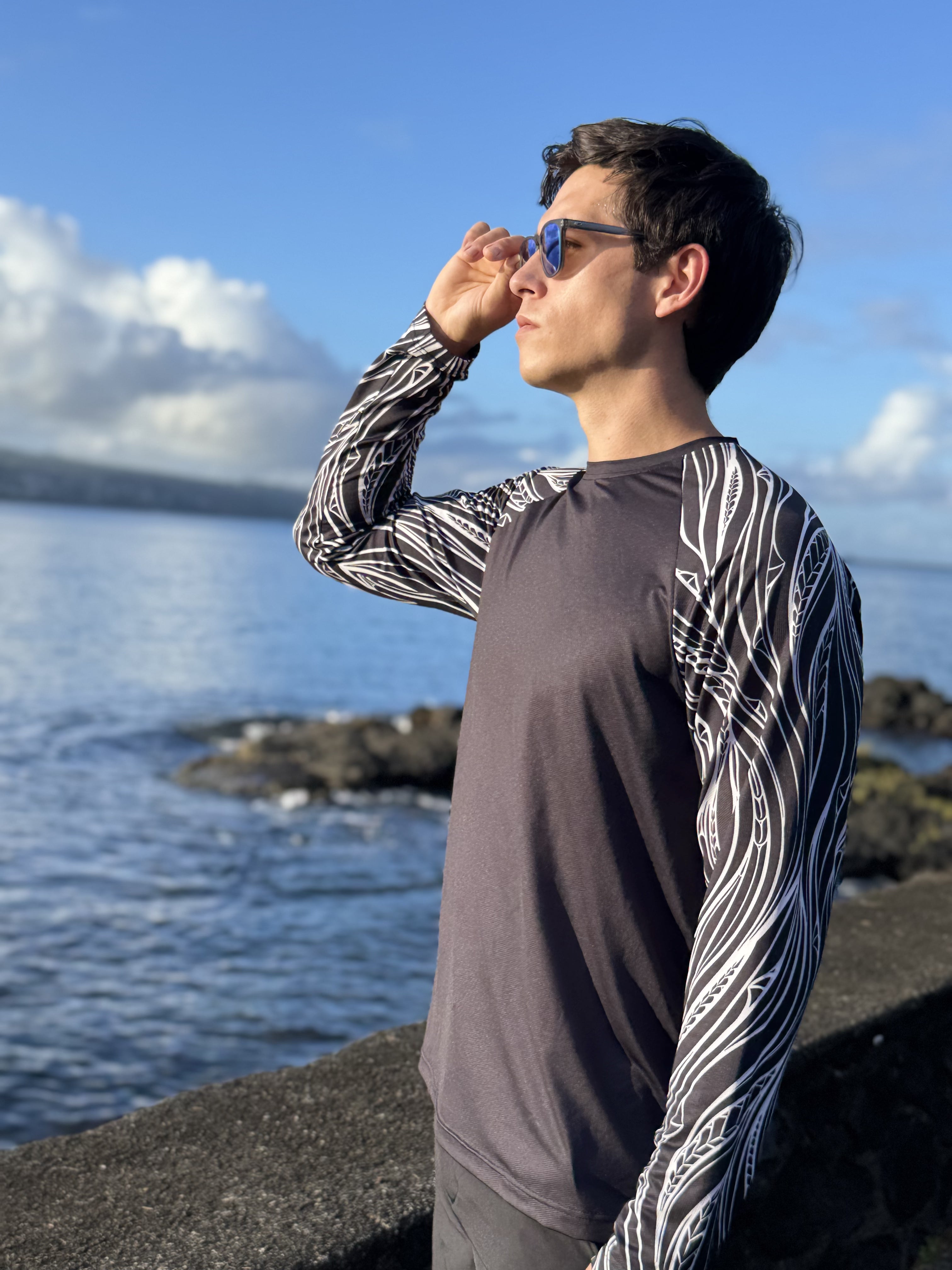 Men’s beach shirt New Zealand – Rerenga wave print, NZ-designed lightweight sun-protective beachwear by Kaleo; travel-friendly smart-casual style