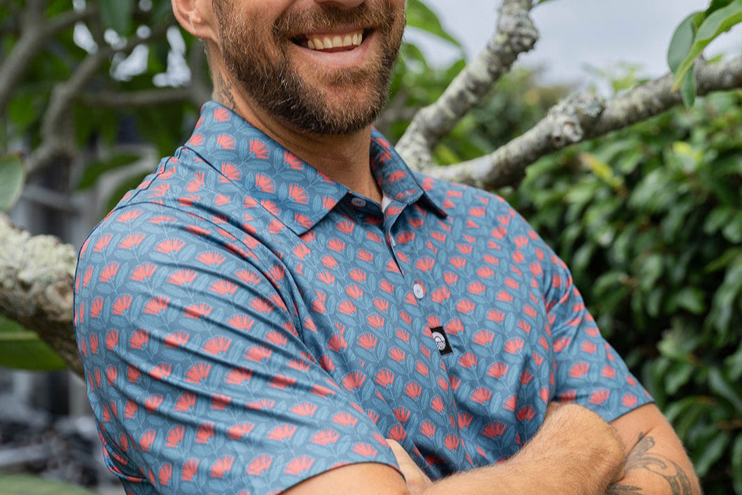 Men’s golf polo New Zealand – Pōhutukawa print, NZ-designed premium golf apparel by Kaleo; lightweight, breathable, comfortable-fit golf shirt