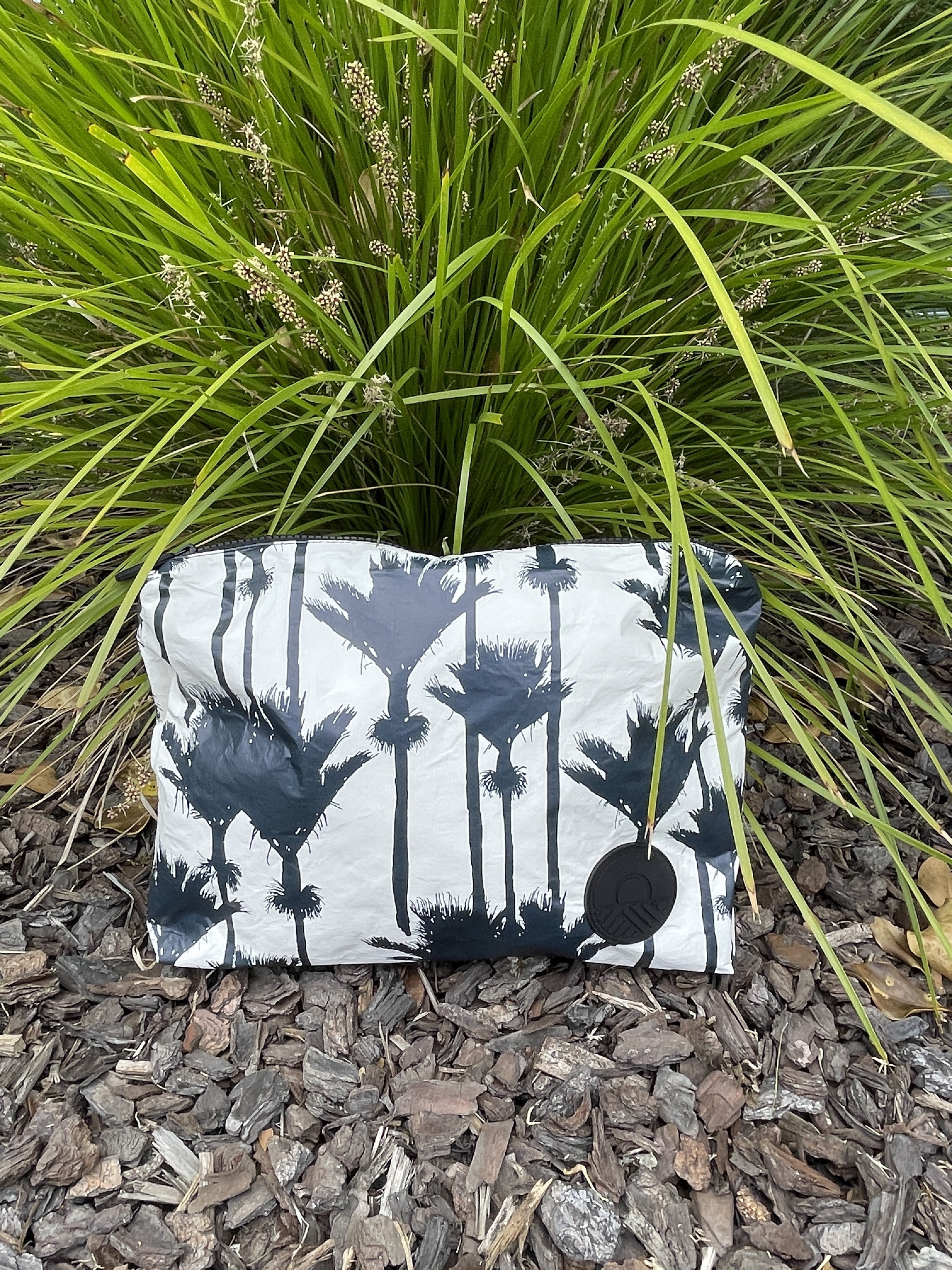 Accessories NZ – splashproof cosmetic bag with Nikau palm print, NZ-designed travel pouch by Kaleo; unique Kiwi gift and New Zealand souvenir.
