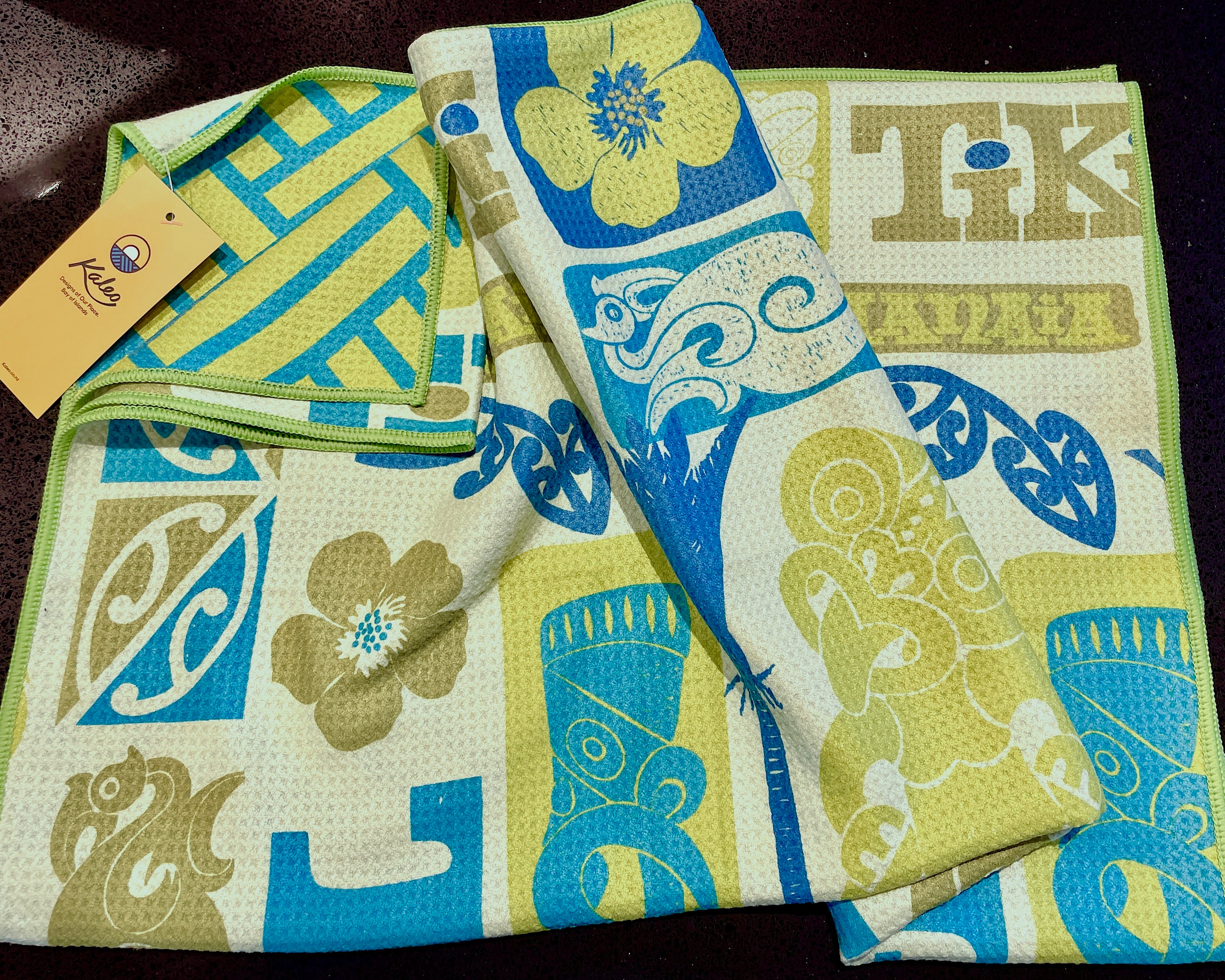 Tiki Manaia beach towel featuring Māori-inspired motifs and bold tiki artwork – quick-dry NZ designed towel by Kaleo