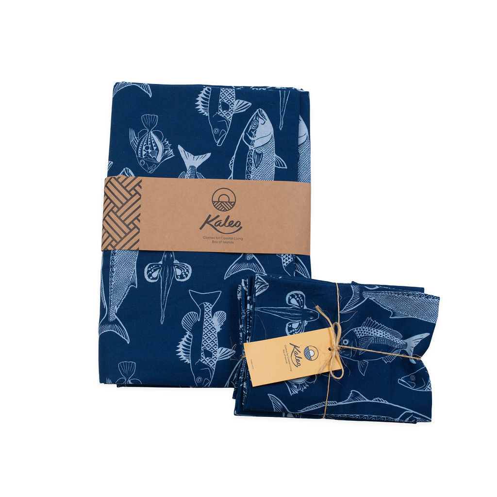 Kaleo BOI Catch Tablecloth 140x260cm featuring navy blue fabric with white NZ fish illustrations, coastal-inspired homeware perfect for Bay of Islands dining and beachside living