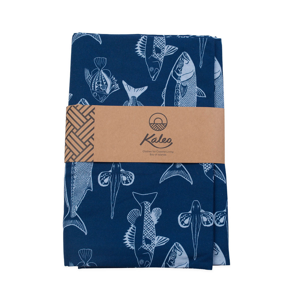 Kaleo BOI Catch Tablecloth 140x260cm featuring navy blue fabric with white NZ fish illustrations, coastal-inspired homeware perfect for Bay of Islands dining and beachside living