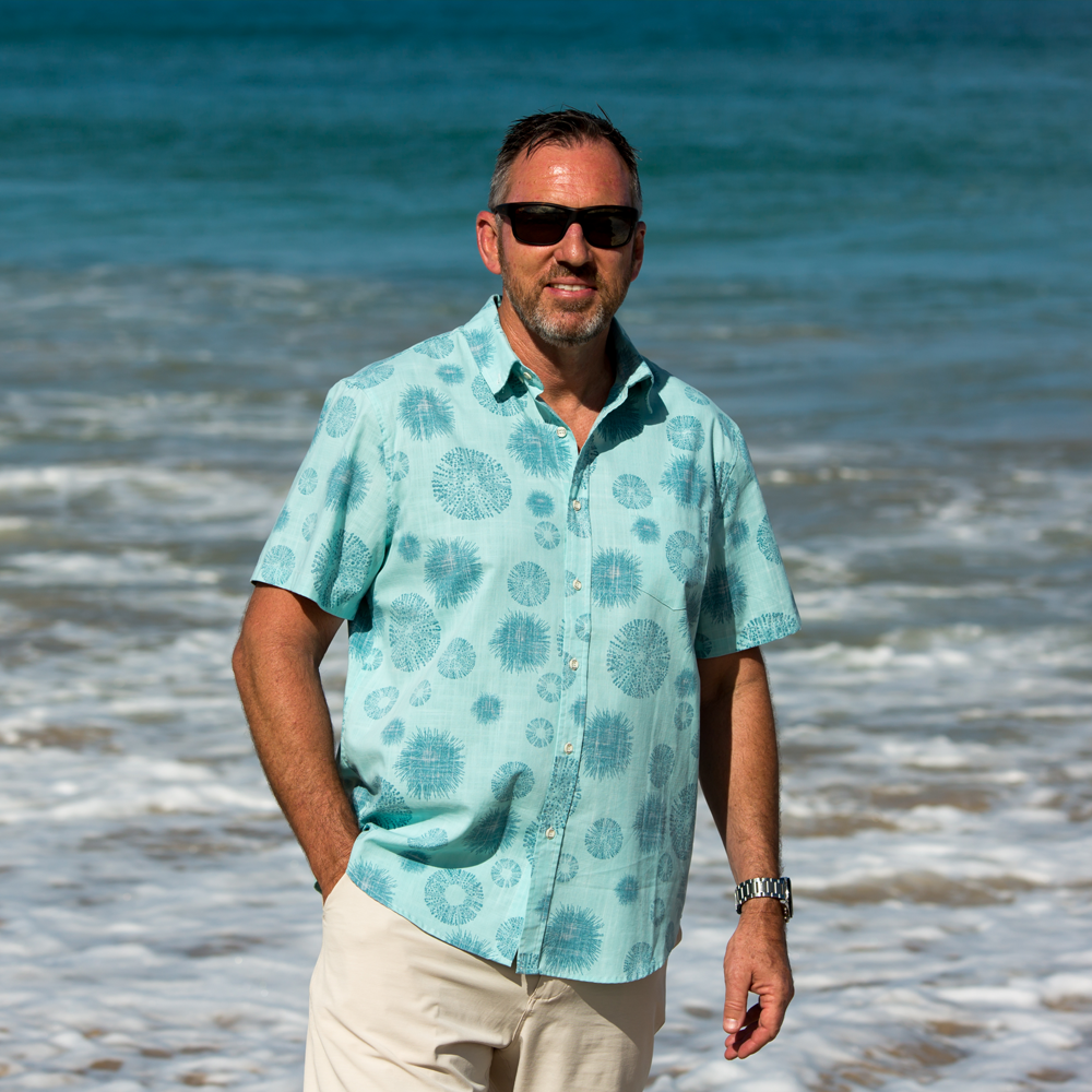 Kaleo Kina Cool men’s Kiwi Classic short sleeve shirt in aqua blue with kina sea urchin print, lightweight summer button-up shirt from New Zealand.
